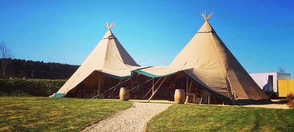 tipi marquee on a summer day